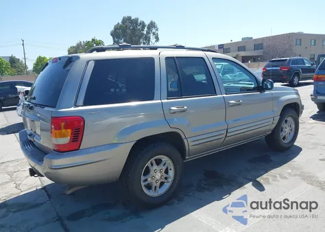 1999 Jeep Grand Cherokee Limited from USA, damaged, VIN 1J4GW68S9XC666797